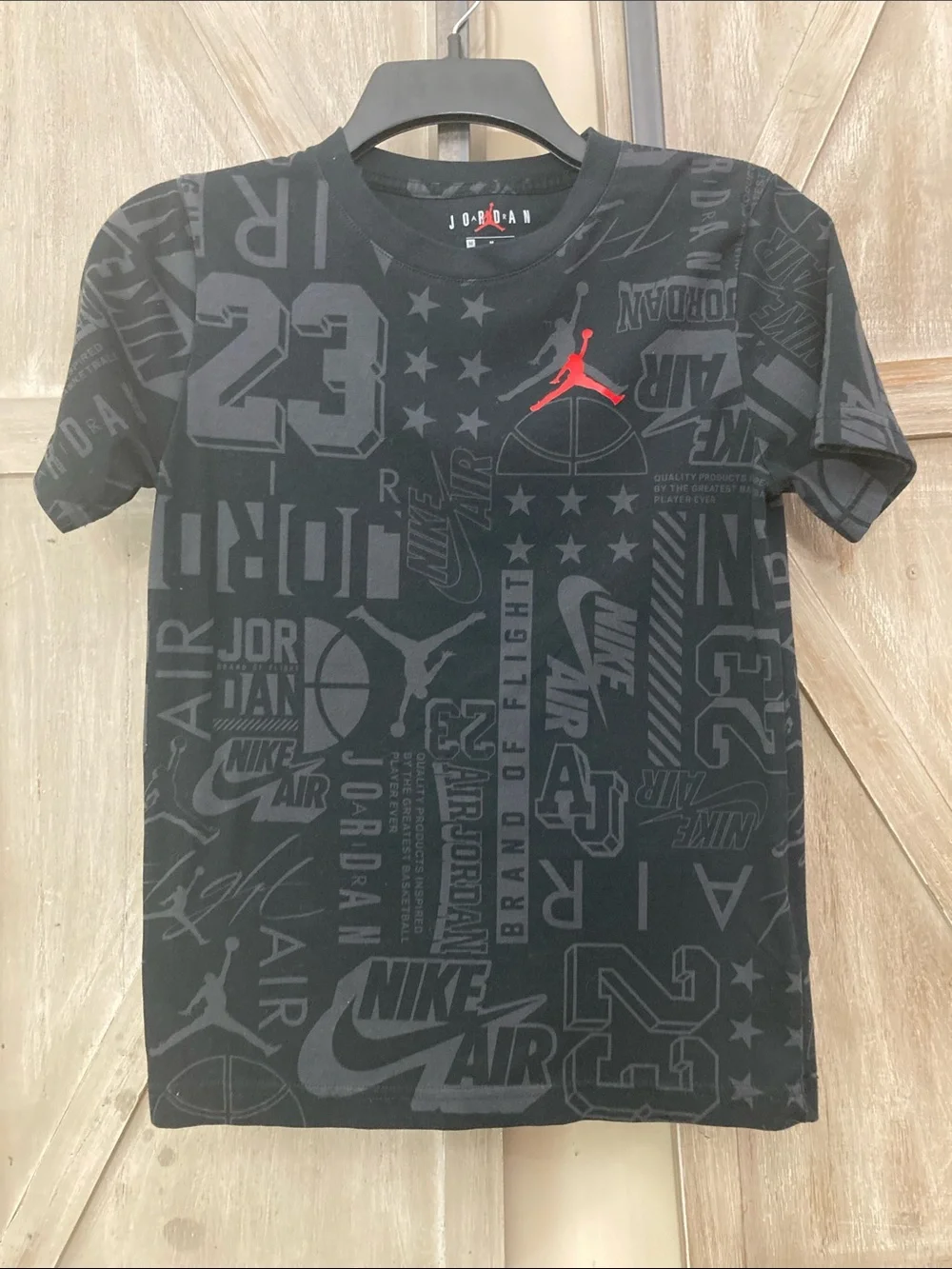 Nike Kids Black All-Over Logo Jordan Tee with Red Jumpman  Size M (10-12 )